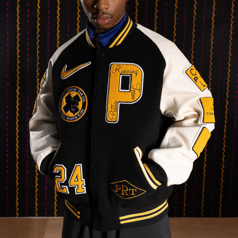Nike x Patta Running Team Varsity SS24 logo