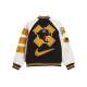 Nike x Patta Running Team Varsity SS24 logo